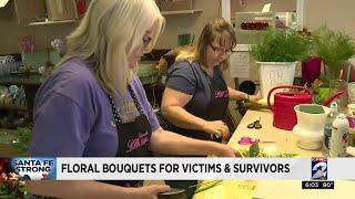 Floral bouquets for victims, survivors