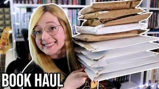 I'm a book mail unboxing channel now