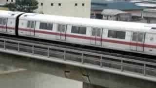 Upclose View of MRT Trains Along The River Crossing