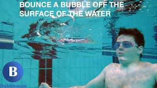 Bubbleman: How to bounce bubble ring off surface of water