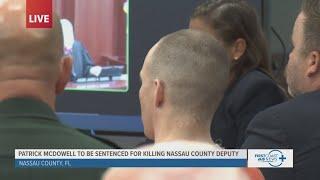 Moment Patrick McDowell learns he'll be sentenced to death for killing of Florida deputy