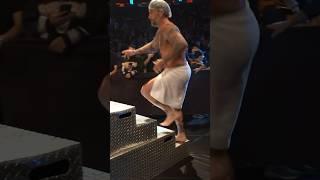 CM Punk leaves the shower to help out