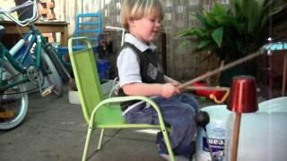 3 year old boy drumming on buckets!!!