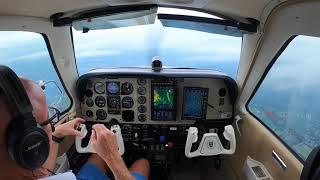 A36 Bonanza IMC, flying thru rain, a little turbulence, and racing a PC12