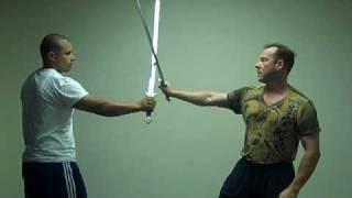 Sifu Robert Dreeben demonstrates a sword disarm from the tai chi sword form