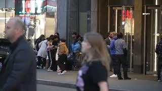 Migrants outside The Row hotel in NYC as Trump's "Mass Deportations" Near