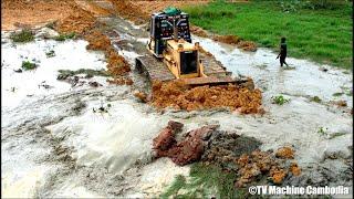 So smart driver skills with stronger KOMATSU D58P dozer pushing soil and truck dumping soil