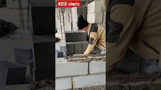 Light-weight concrete block laying technique for a residential building