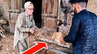 Elderly man sawing wood on ara machine | Awan Wood Works