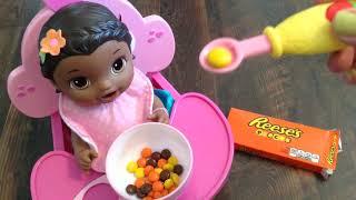 Baby Alive Super Snackin' Lily Doll eats Reese's Pieces Candy for a Snack!