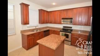 199 E Thatch Palm Circle - Botanica Townhome For Sale - Jupiter, Florida