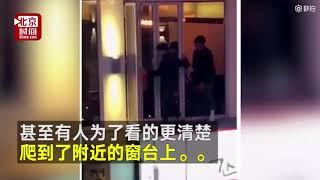 韩情侣宾馆“酣战”忘拉窗帘 引路人驻足看“直播”