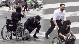 What if a person in a wheelchair spills an object at a crosswalk? | Social Experiment