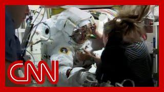 NASA halts spacewalks after water leaked into astronaut's helmet