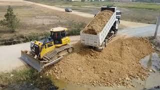 Full Video Team Work Heavy dump truck unloading soil Filling/Stronger Dozer Pushing soil Fill Land