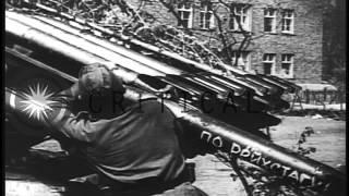 Berlin falls as the Soviet Army plants a Victory Banner on the Reichstag April 30, 1945