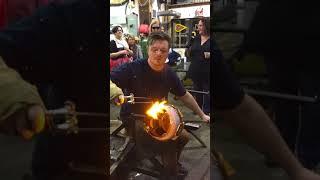 Glass artist Jaan Andres and the Terminal City Glass Co-op team create a flaming "Wish Vase"