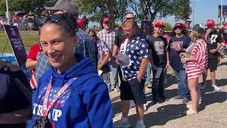 Supporters line up to see former President Donald J. Trump at Flint town hall