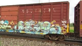 Westbound local freight train setting-out freight cars on the siding at Pavilion, MI