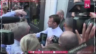 Macron greets crowd during holiday walkabout in Le Touquet