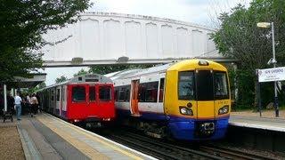 One Of Each Train Passes At Kew Gardens Station (London)