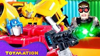 Bumblebee, Twitch, and More Transformers Race Through Toy City! | Toymation