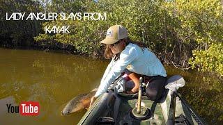 LADY ANGLER SLAYS FROM KAYAK