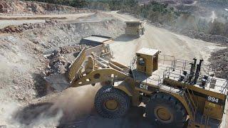 Huge Caterpillar 994 Wheel Loader Loading Caterpillar Dumpers - Samaras Mining Group