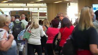 Orlando airport bustling as families travel during spring break