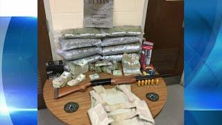 Police seize drugs, gun, cash during search warrant