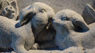 Bunnies in a Flower Garden sculpture AC Button II Carolina Sculpture Studio