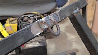 Welding up a tool to lift a beam.