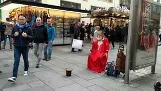 Funny street performer on Marco-d'Aviano-Gasse in Vienna, Austria (November 2018)