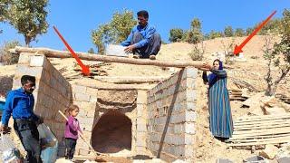 return of Ostad Nama's father: Building dreams with wooden beams in magical hut of Heroine's mother.