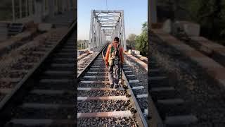 Lineman (Part-1) walking on the railway tracks