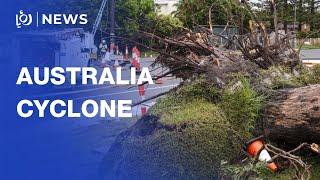 Australia cyclone: Emergency crews rescue people stranded in floodwaters