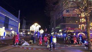 Multiple casualties after car drives into crowd at Christmas market in Germany