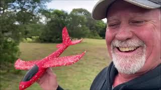 Dude finds a foam airplane and throws it off a huge cliff into the ocean !!