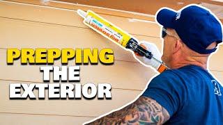 Painting a house ALONE!  Caulking The Exterior.