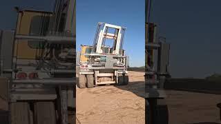 Expert Hay Squeeze Truck Operator Adjusts Load