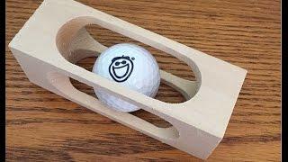 Mystery Golf Ball in a Block of Wood (WoodLogger.com)