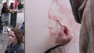 Portrait demonstration by place du tertre artist Samuel.