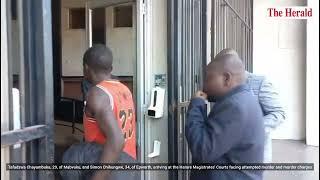 Two suspects arriving at the Harare Magistrates' Courts facing attempted murder and murder charges