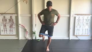 Banded hip abduction in single leg standing | hip and knee rehab exercise
