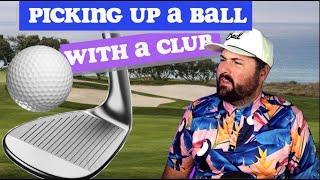 HOW TO PICK UP A GOLF BALL WITH A GOLF CLUB. Picking up a ball with a wedge.