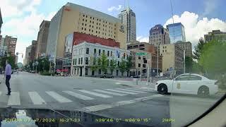 Cop ignores semi running a red light