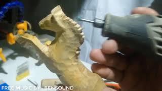 Woodcarving a jumping horse