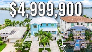 This $4.9M Treasure Island, FL Waterfront Home w/STUNNING VIEWS Will Wow You!