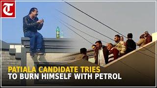 Police avert mishap after a Patiala candidate tries to burn himself with petrol on car rooftop