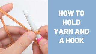 How to hold yarn and a hook for crochet